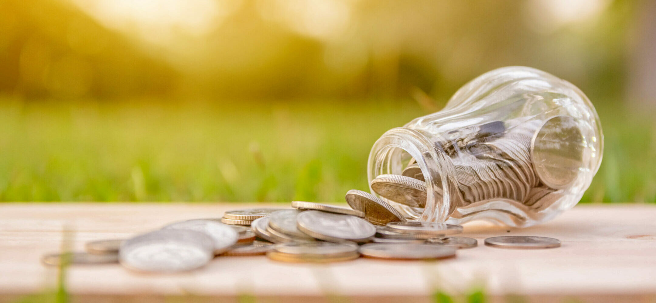 Coins,In,Glass,Bottles,,Savings,Money,Ideas,background,Blur Coins in Glass Bottles, Savings Money Ideas,Background blur